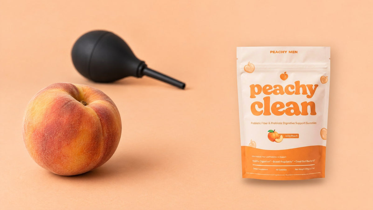 A peach in focus with an unused douche bulb behind it and the Peachy Clean bag
